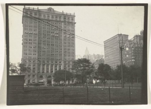 View of a skyscraper, with Central Park in New York in the foreground