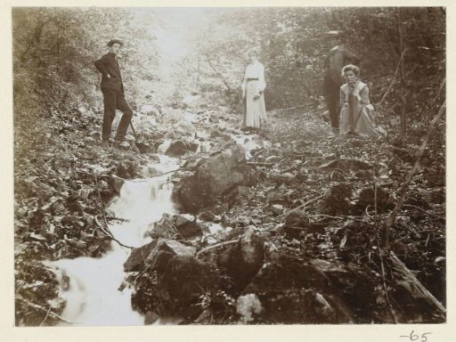 Portrait of Margo Kessler-de Lange, with Dolph behind her during a forest walk in the Harz