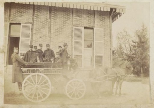 Group of French soldiers in a horse-drawn carriage