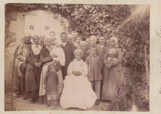 Group portrait of a French peasant company, possibly at a wedding