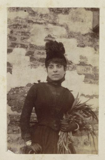 Portrait of a young woman holding a bouquet