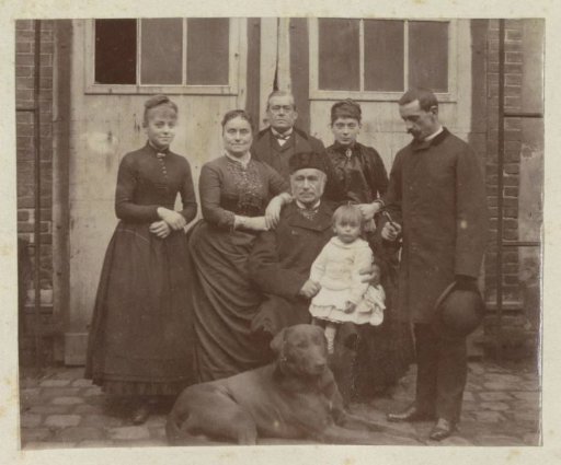 Group portrait of a French family with a dog