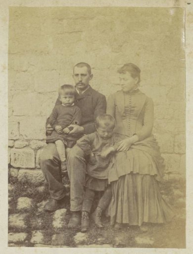 Group portrait of a French couple with two children