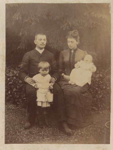 Group portrait of a French couple with two children