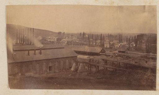 Landscape with a factory complex in France, possibly a wood-processing company