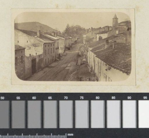 View of a village street, presumably in Arnaville