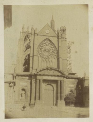 Church with church portal, partially in scaffolding, probably in France