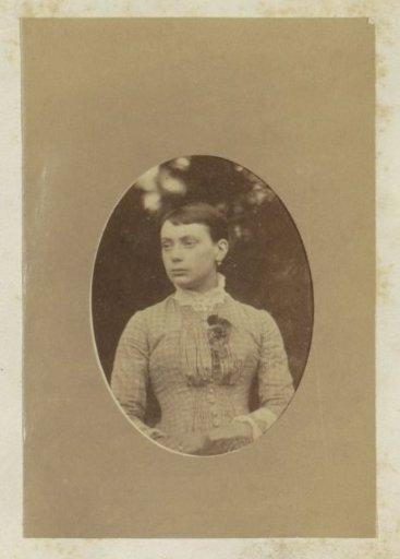 Portrait of an unknown Frenchwoman in a checkered dress