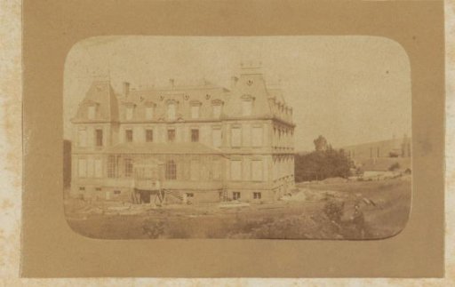 Country house with greenhouse under construction, probably in France