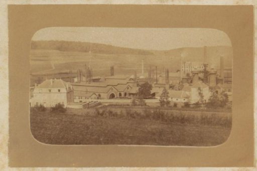 View of a factory complex with villa, probably in France