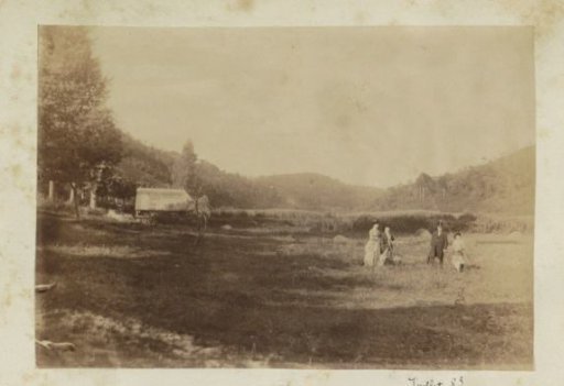 Group standing in a field in France
