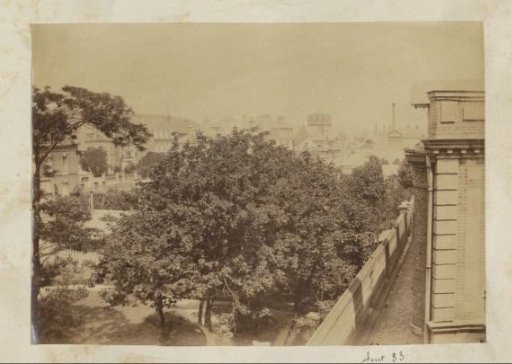 View of houses and gardens in a French town