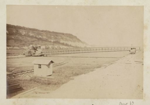 Landscape in France with (presumably) an excavator and a conveyor belt