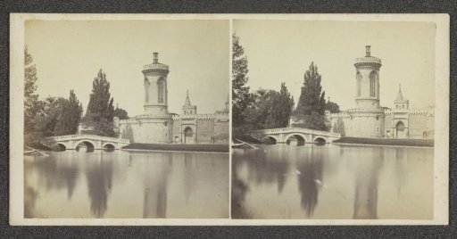 View of a tower and bridge at a lake