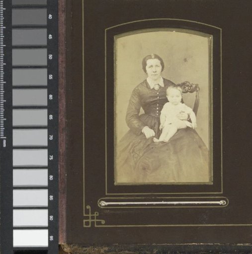 Portrait of a woman with a baby on her lap