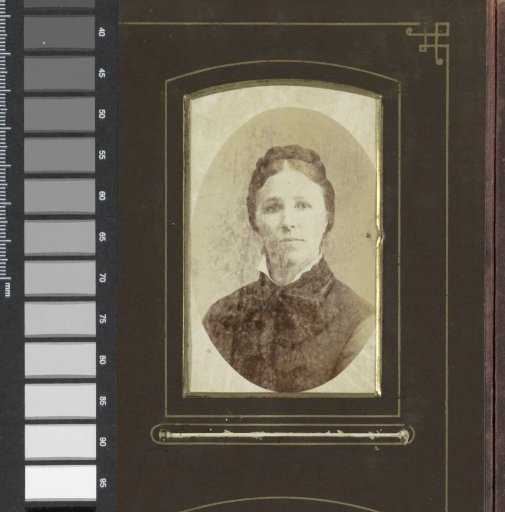 Portrait of a woman with her braided hair pinned up