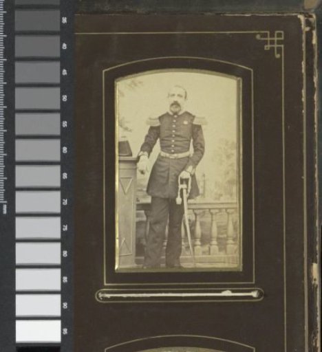 Portrait of a man in a military uniform, standing