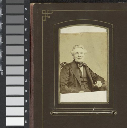 Portrait of a man with a cigar in his hand