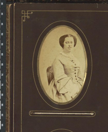 Portrait of a woman in a dress, seated