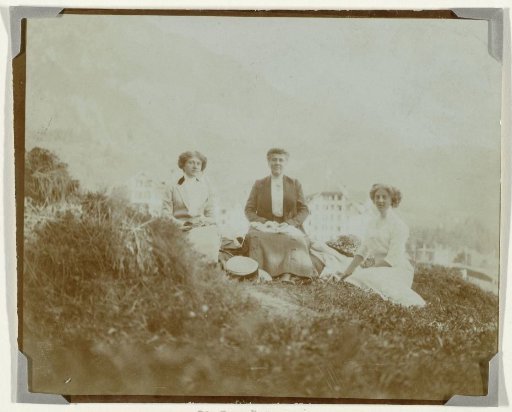 Three Women Sitting in the Grass