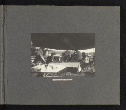 Joseph Harvey Ladew and his party having breakfast on the deck of the Columbia in the harbor of Havana