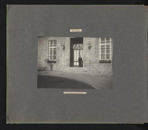 Man in front of the entrance to the headquarters of General William Ludlow in Havana