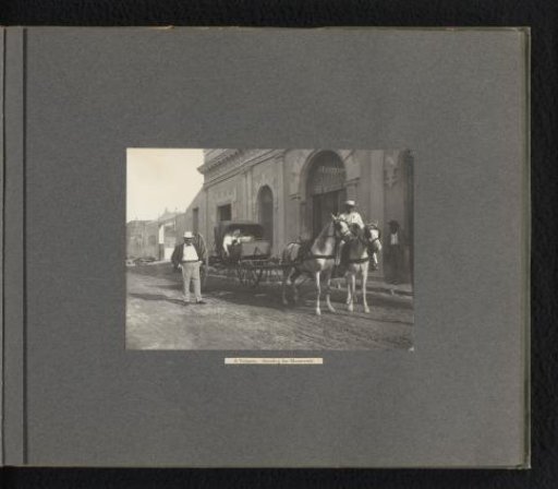 Joseph Harvey Ladew next to a carriage with two women, Matanzas