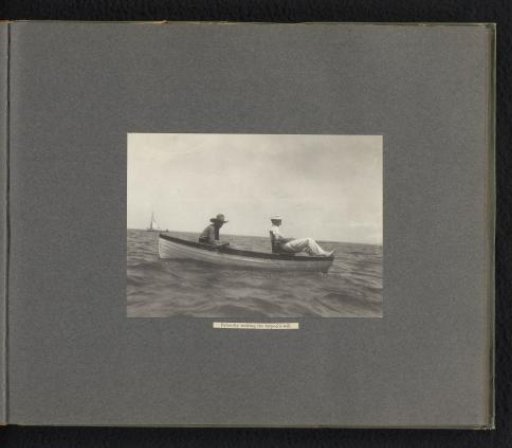 Two men in a fishing skiff