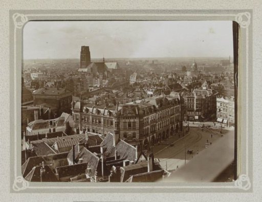View of the Plan C business complex in Rotterdam, with the Laurenskerk in the background