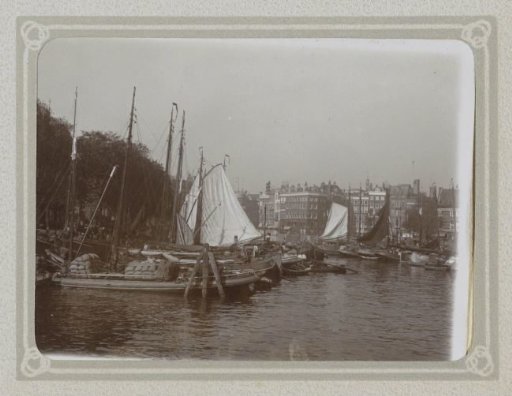 Boats on a waterway, possibly the Amstel in Amsterdam