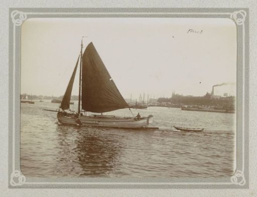 Sailing ship with a skiff on the Maas