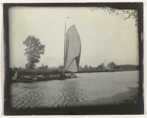 View of a canal, Netherlands, with a sailing ship