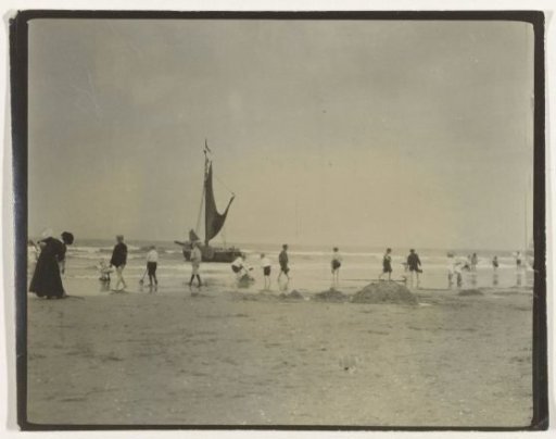 Children and a woman at the sea, with a sailing ship in the background (North Sea coast), Netherlands or Germany