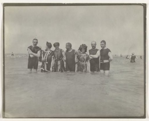 Group portrait of people in the sea (North Sea coast), Netherlands or Germany