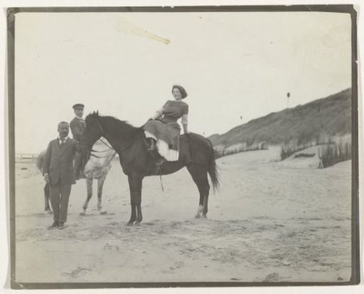 Man and woman on horseback on the beach (North Sea coast), Netherlands or Germany