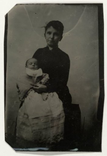 Portrait of a woman with a (deceased?) child in her arms