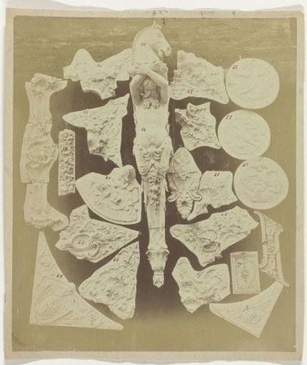 Composition of plaster ornaments, including a caryatid, from the workshop of J. Delbove, Brussels
