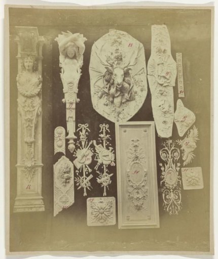 Composition of plaster ornaments, including two caryatids, from the workshop of J. Delbove, Brussels, Belgium