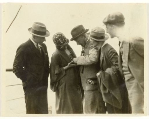 Group of American tourists aboard an ocean liner bound for Europe or returning from it