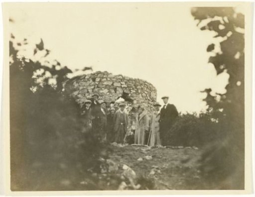 Group of American tourists at a tower ruin, England