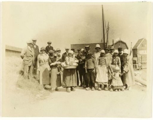 Group of American tourists in the company of fisher girls, Volendam