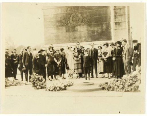 Group of American tourists at a commemoration at the Arc de Triomphe in Paris