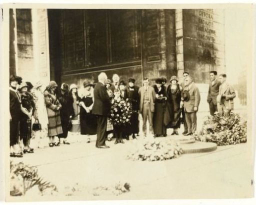Group of American tourists at a commemoration at the Arc de Triomphe in Paris