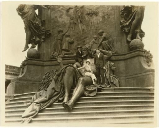 Group of American tourists at a monument, possibly in France