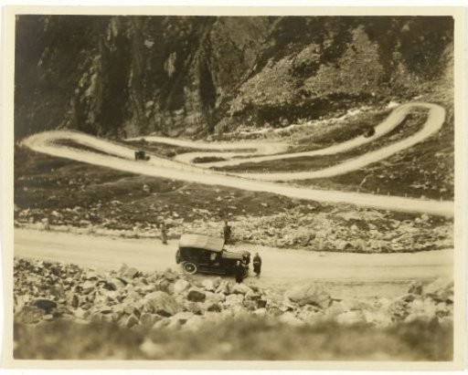 Group of American tourists with their car in the Alps