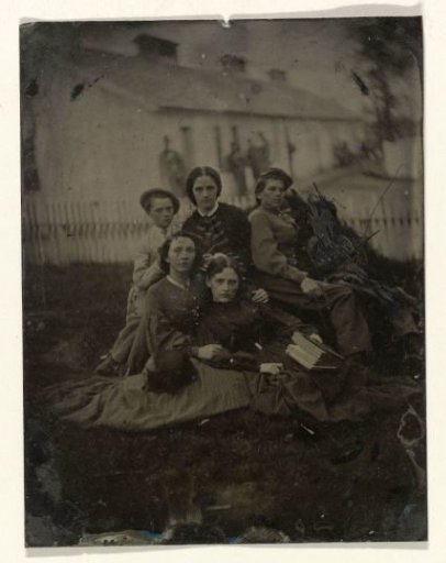 Group Portrait of Six Persons in Front of a House