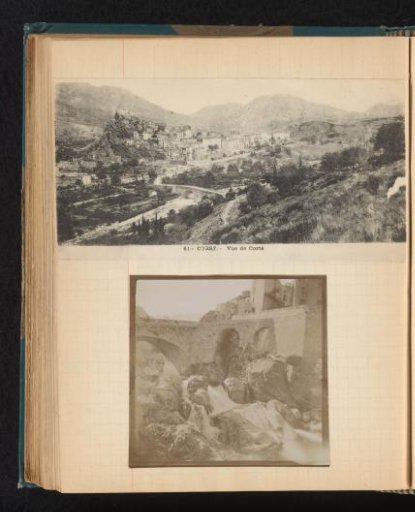 View of Corte amidst a mountain landscape and a stone bridge with waterfall