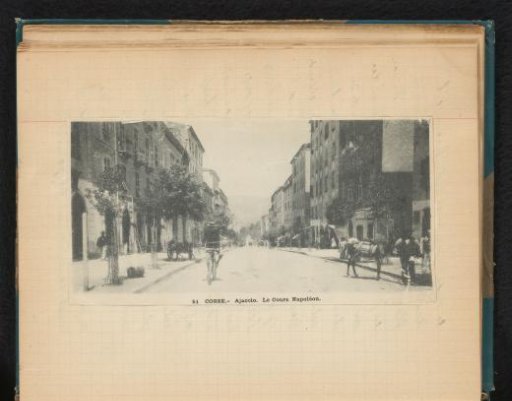 Street View with a Man on a Bicycle and a Donkey on Le Cours Napoléon in Ajaccio, Corsica