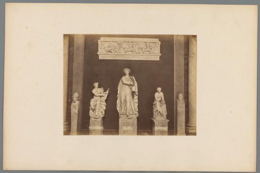 Sculptures of Calliope, Apollo, and Terpsichore with two herm statues on either side in the Vatican Museums, Italy