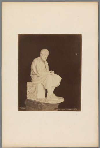 Sculpture of a seated Greek philosopher in the Villa Borghese, Rome, Italy